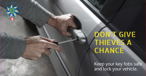 Image of a man breaking into a vehicle.  Image includes written text  Don't give thieves a chance. Keep your remote access key fobs in a safe place and lock your car doors.