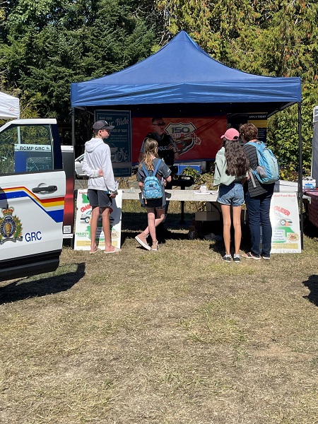 people joining the RCMP booth